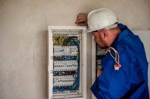 Electrician with Fuse Board